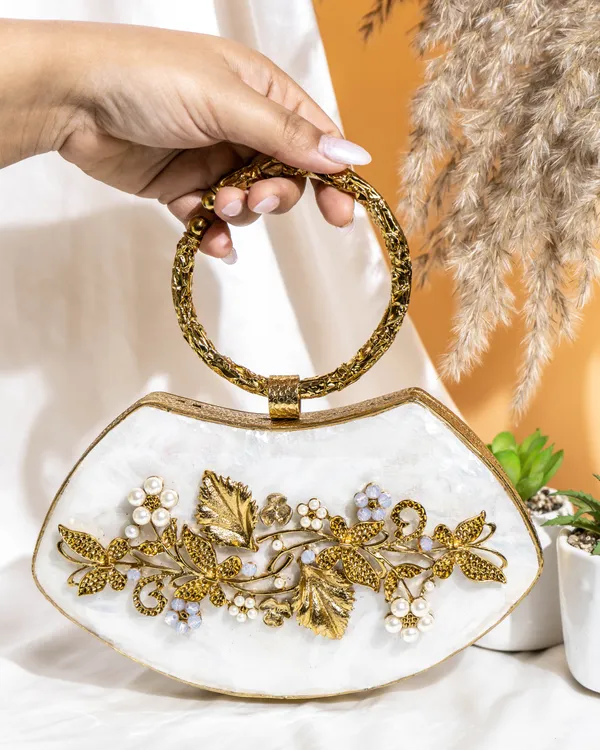 Noura_Embellished_MOP_Clutch_with_Floral_Gold_Detailing
